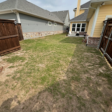 Backyard-Redesign-with-Artificial-Turf-Putting-Green-Landscape-Rock-Installation-in-McKinney-TX 1